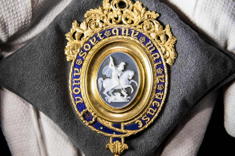 Great Britain, The Most Noble Order of the Garter, a magnificent Lesser George Sash Badge, with central agate cameo of St George and the Dragon by Benedetto Pistrucci set in a fine 22 carat gold and blue enamel mount by William Clutton, with engraved presentation inscription on the reverse Estimate £100,000-150,000