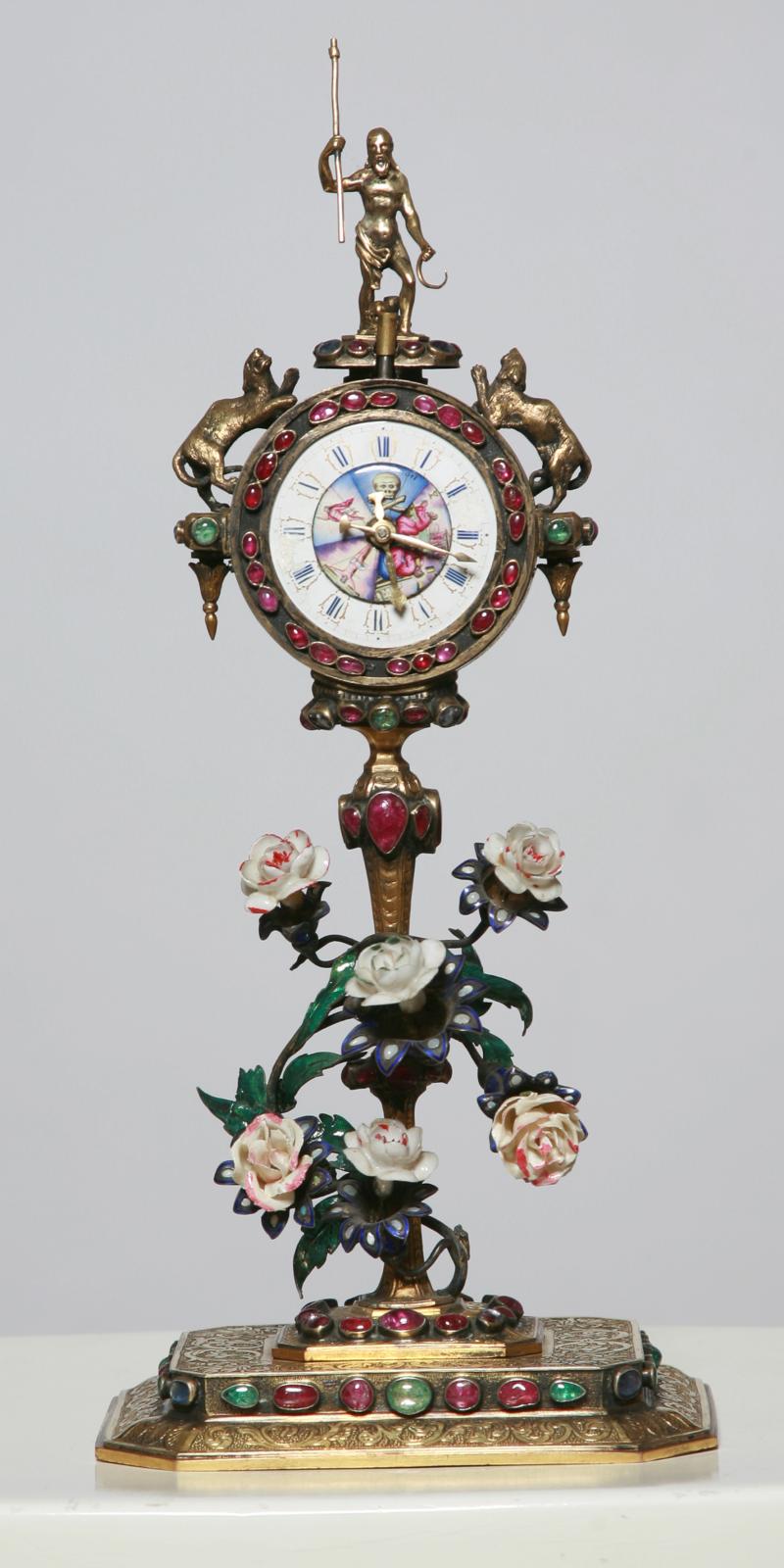 Seltene Wiener Uhr, vergoldet mit Schmucksteinbesatz und Blumen aus Email, Spindelwerk mit Repetition  Wien 19. Jh., H: 30 cm  Kunsthandel Strassner