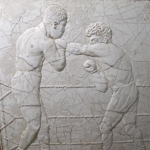 Relief panel of Joe Louis and Max Schmeling boxing for the World Championship in 1938 in Yankee Stadium  American Primitive