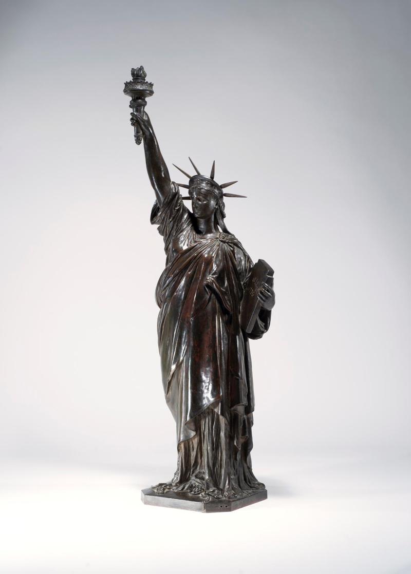 Frédéric Auguste Bartholdi (1834 - 1904)  La Liberté éclairant le monde - The Statue of Liberty. Bronze, unique, with its original sellette Measurements: 133.5 x 33.1 x 33.8 cm.  (52 ¾ x 13 x 13 ¼ in.)   Bailly Gallery