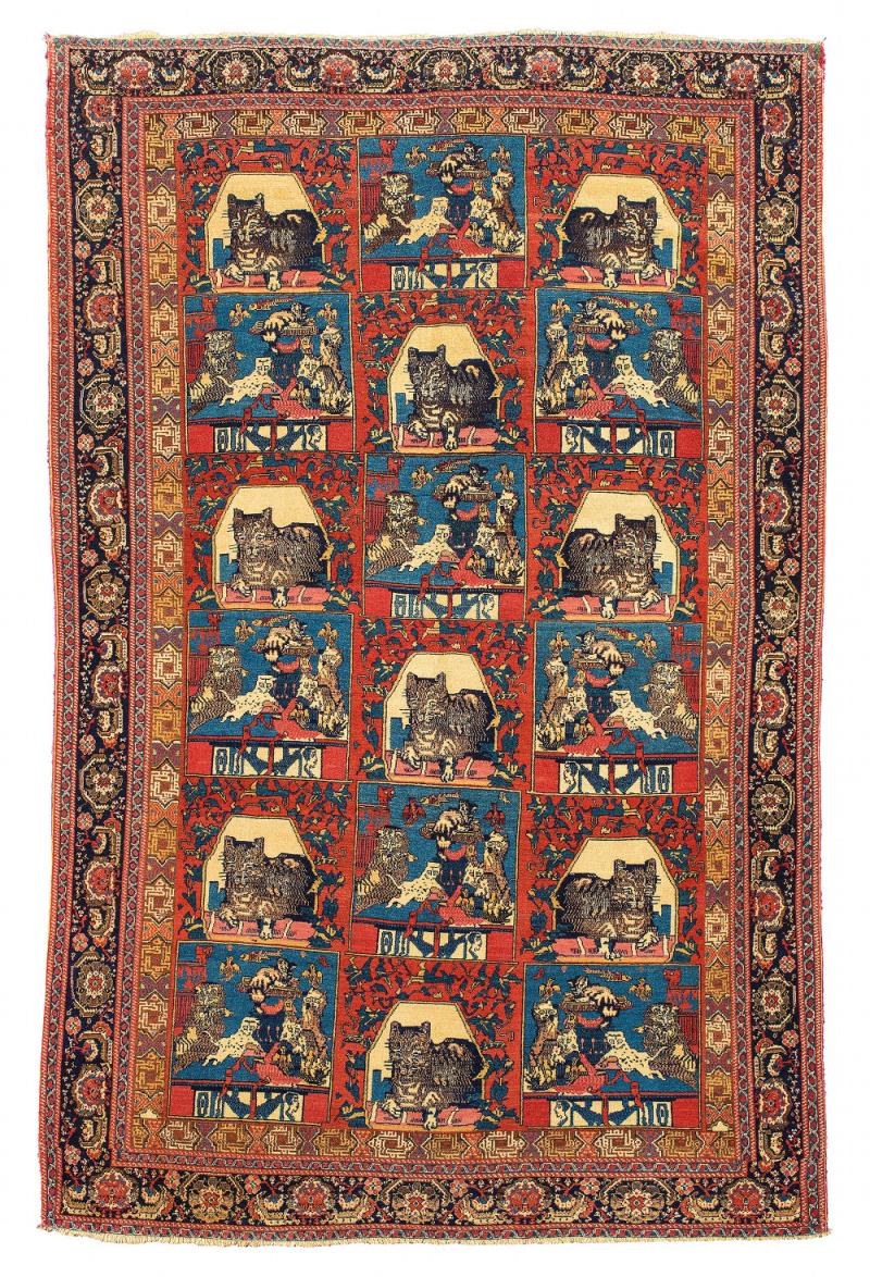 Lot Nr. 53  Senneh Bildteppich, Nordwestpersien (Iran), ca. 231 x 145 cm, Ende 19. Jh. ausgesprochene Teppichrarität in feiner Knüpfeinstellung auf Seidenkette und seidenen Schirazi gefertigt, in 3 x 6 Felder ist der Fond des Unikats mit außergewöhnliche Katzendarstellungen unterteilt, die Katzenfelder sind abwechselt einzeln oder in der Gruppe diagonal angelegt, die "Gruppenbilder" sind zusätzlich mit einer Kartusche ausgestattet, dieses Paneel mit Kopfdarstellung und die ins Bild reichende apo