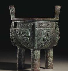 A superbly cast bronze ritual vessel, Li Ding, with animal mask pattern and inscription Late Shang Dynasty, Anyang period phase II (c.1250-1160 BC)  H. 21.7 cm  Joyce Gallery, Hong Kong