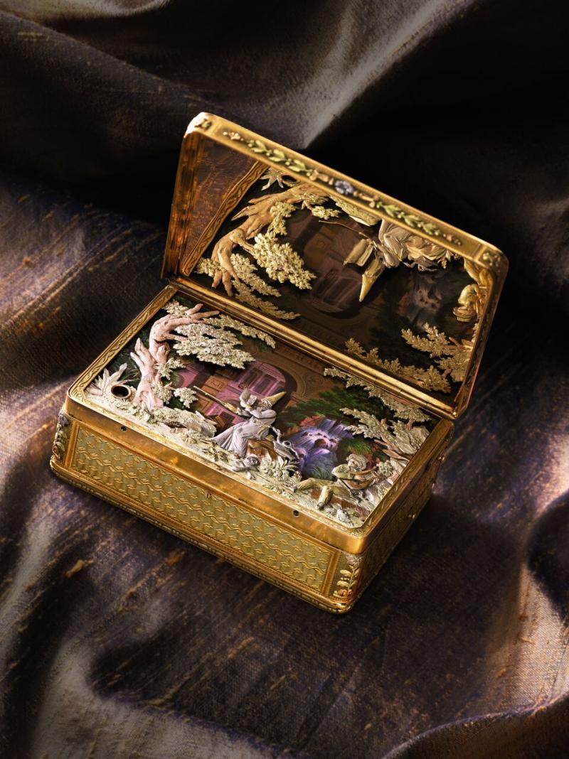 Lot 81 The Celebrated King Farouk Magician Box A Superb Four Color Gold and Musical Automaton Magician Snuff Box Attributed to Piguet & Meylan Goldsmith’s Mark of Chenevard Jouvet & Cie, Geneva Circa 1820 Estimate $1,500,000-2,500,000