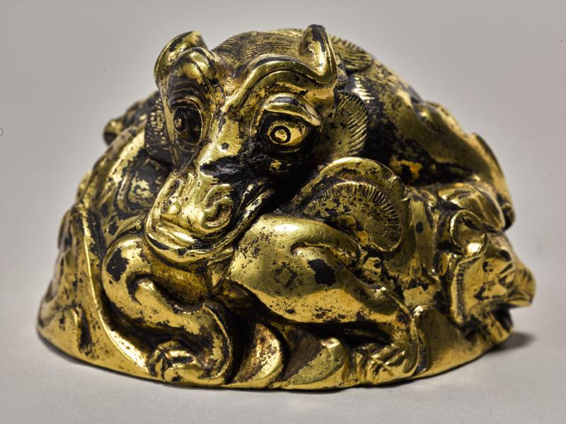 Lot 15 A Rare Gilt-Bronze 'Mythical Beast' Weight Western Han Dynasty Width 4 1/8 in., 10.5 cm Estimate $60/80,000