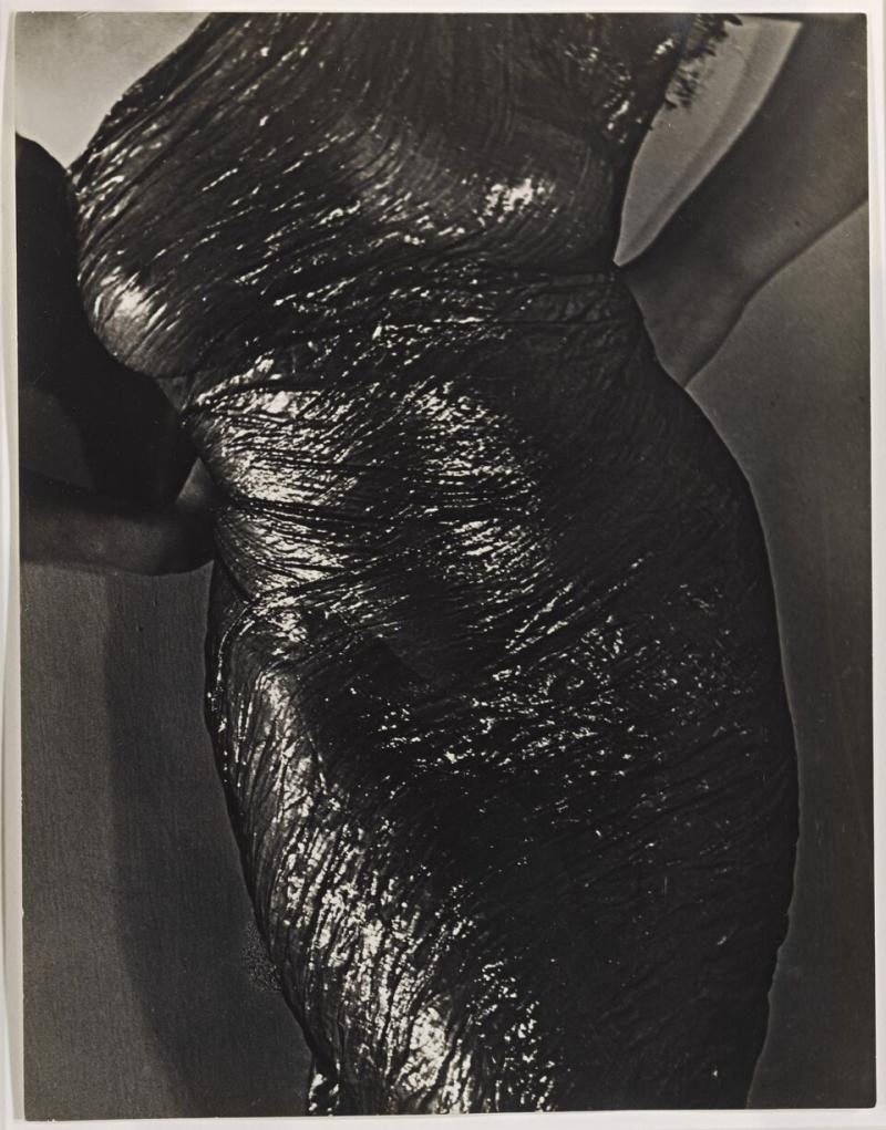 Lot 100 Man Ray 'TORSO (LAMA [SIC] SHEATH)' titled in pencil and with the photographer's '31 bis, Rue Campagne Première Paris XIV' studio stamp (Manford M28) on the reverse, framed, 1929 11 1/2  by 8 7/8  in. (29.2 by 22.5 cm.) Est. $80/120,000