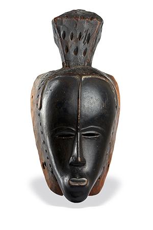 Lot  97 Important Guro Mask Ivory Coast H: 38 cm (1’ 3”)  Estimated age: 19th century, Estimate: € 45.000 - 55.000