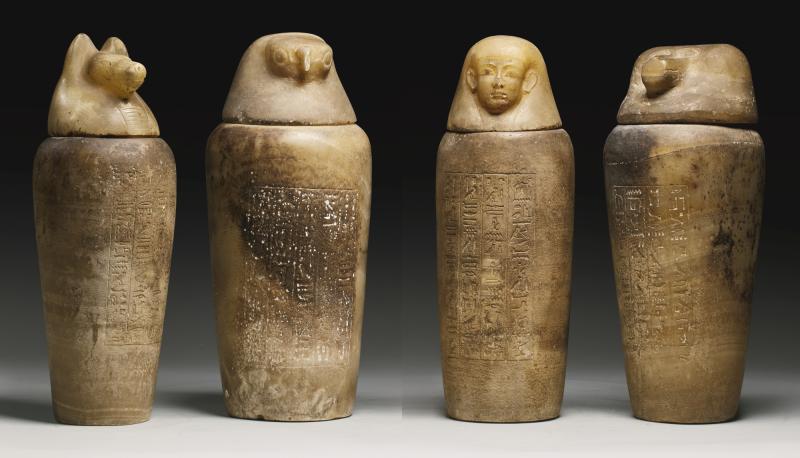 Lot 102 A Set of Four Egyptian Alabaster Canopic Jars, 26th Dynasty, 664-525 B.C.