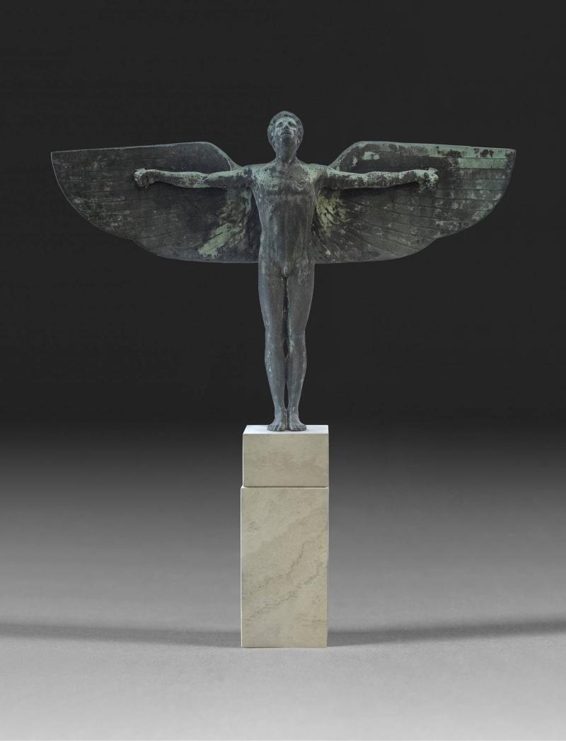 PETER BREUER (1856-1930), MONUMENTALE FIGUR DES IKARUS, Bronze, grün patiniert, römischer Travertin. Ges.-H. 199 cm, H. 119 cm (Figur). Erlös 18.700,- €