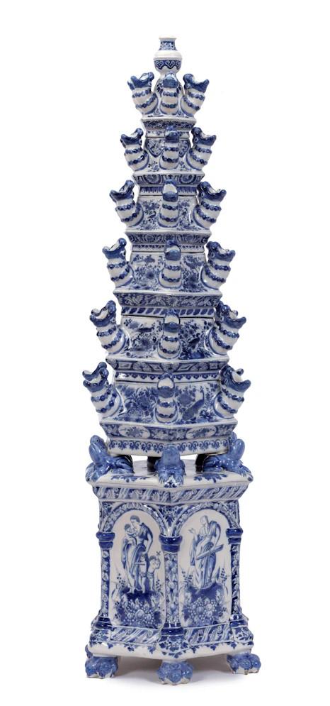 Flower Pyramid (c. 1690) by Adrianus Kocx of De Grieksche A (The Greek A) Factory. Tin-glazed earthenware, painted in blue; 95 cm. Courtesy of Aronson Antiquairs.