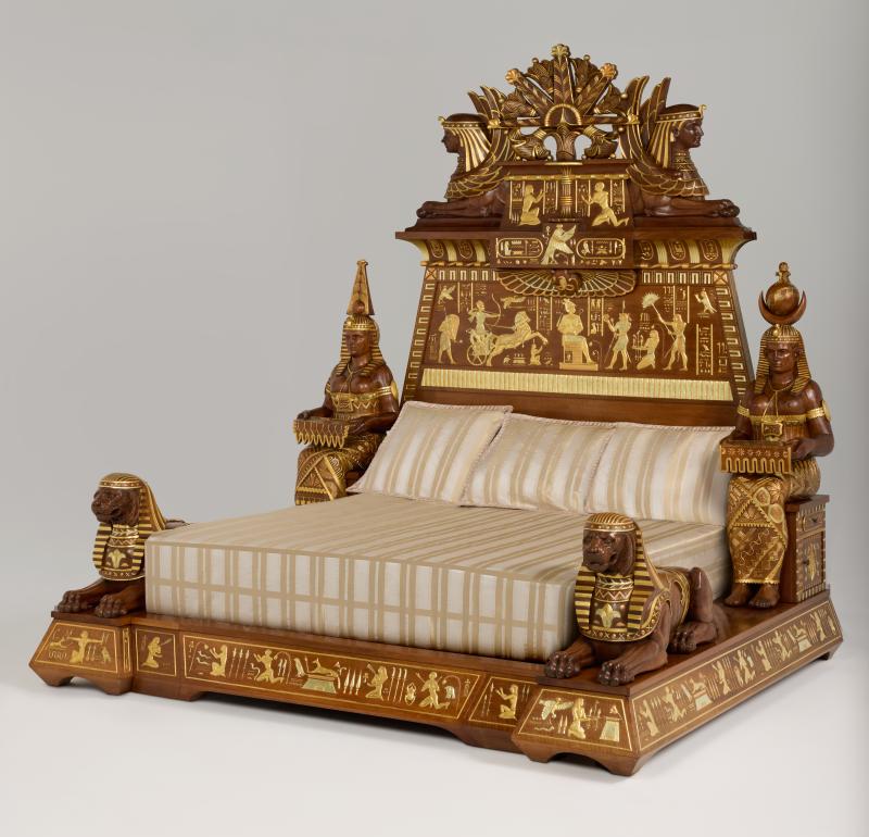 Galerie Marc Maison  Louis Malard, French cabinetmaker Monumental bed in Egyptomania style, 19th century Walnut with polychromy Presented at the 1889 Exposition Universelle in Paris. This bed is part of a complete bedroom set H 271 x W 232 x D 260 cm